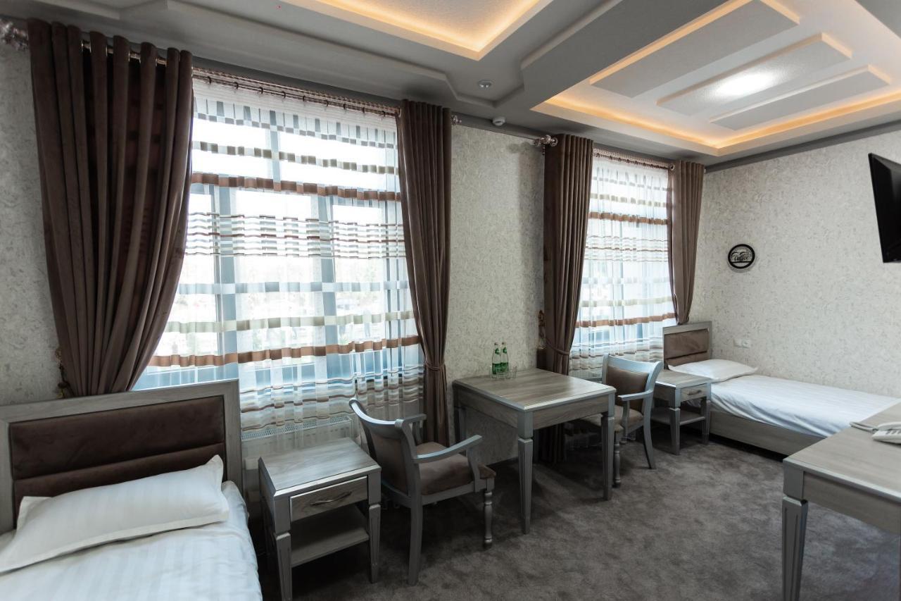Diyor Hotel Marghilon Extérieur photo