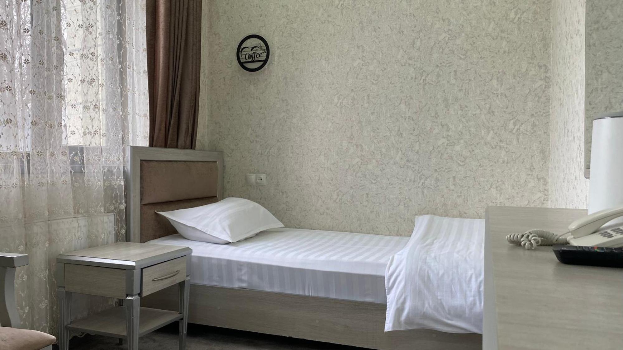 Diyor Hotel Marghilon Extérieur photo