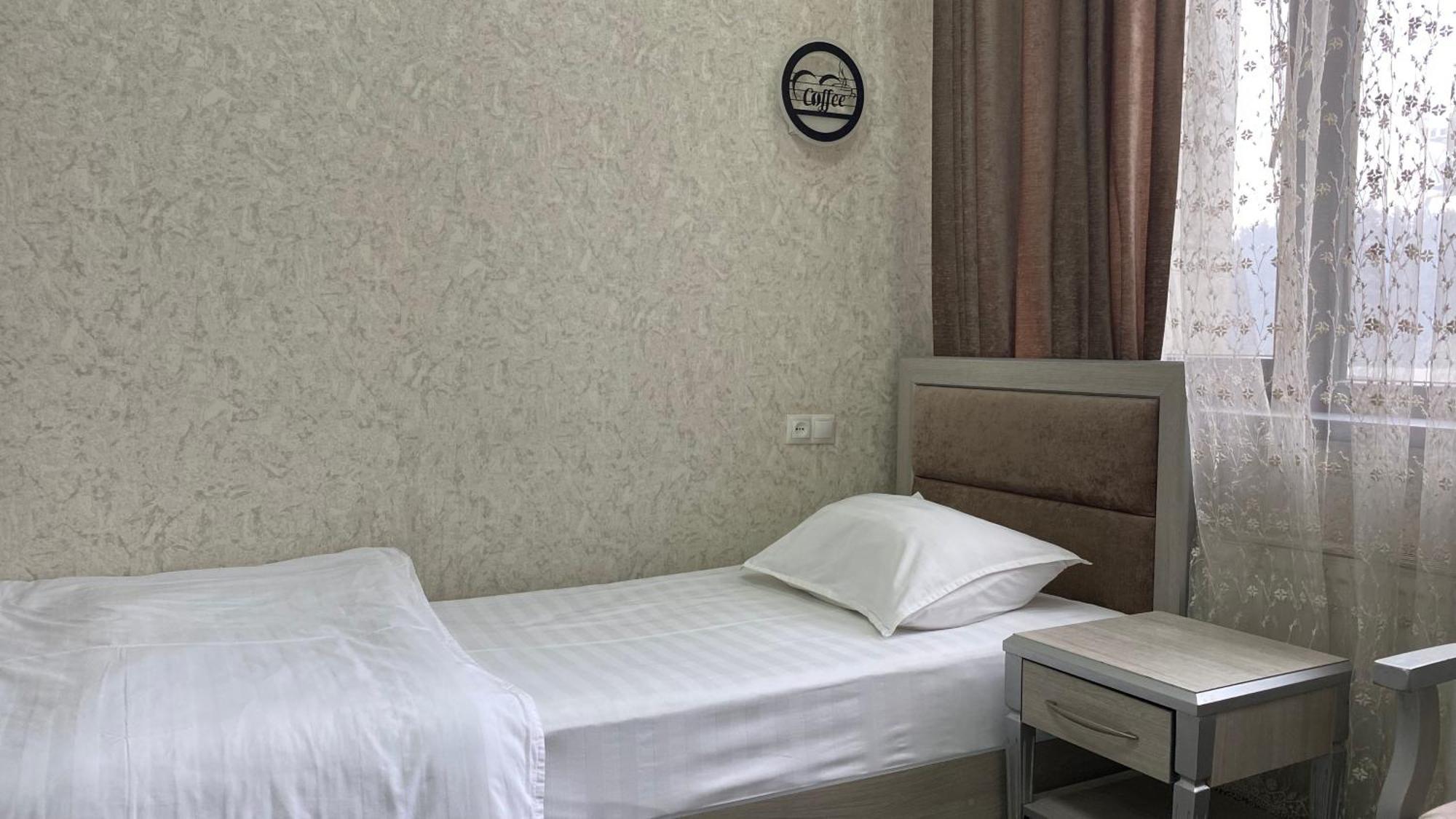 Diyor Hotel Marghilon Extérieur photo