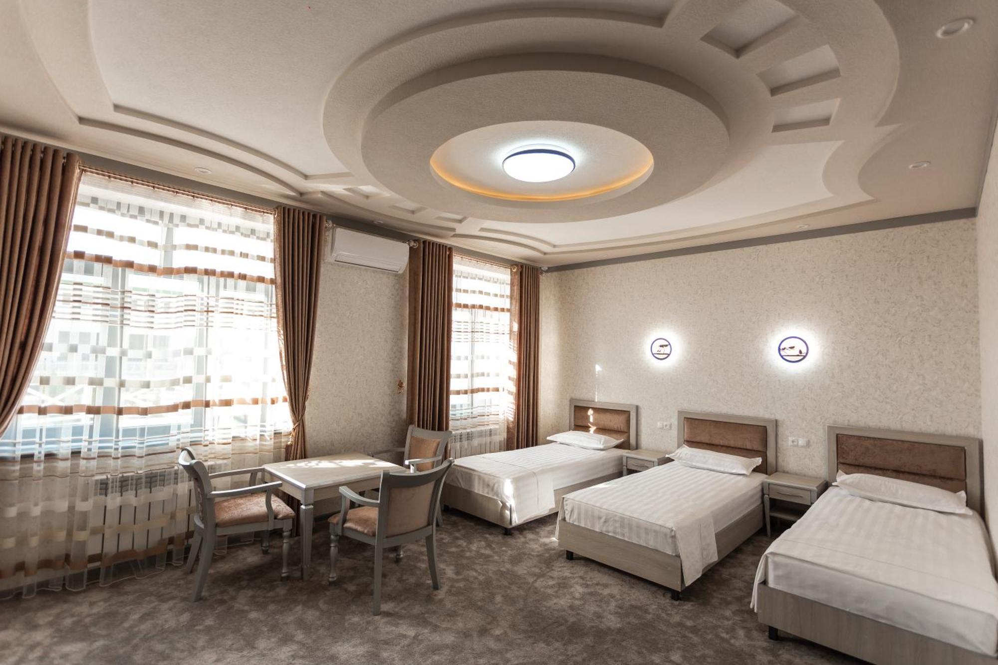 Diyor Hotel Marghilon Extérieur photo