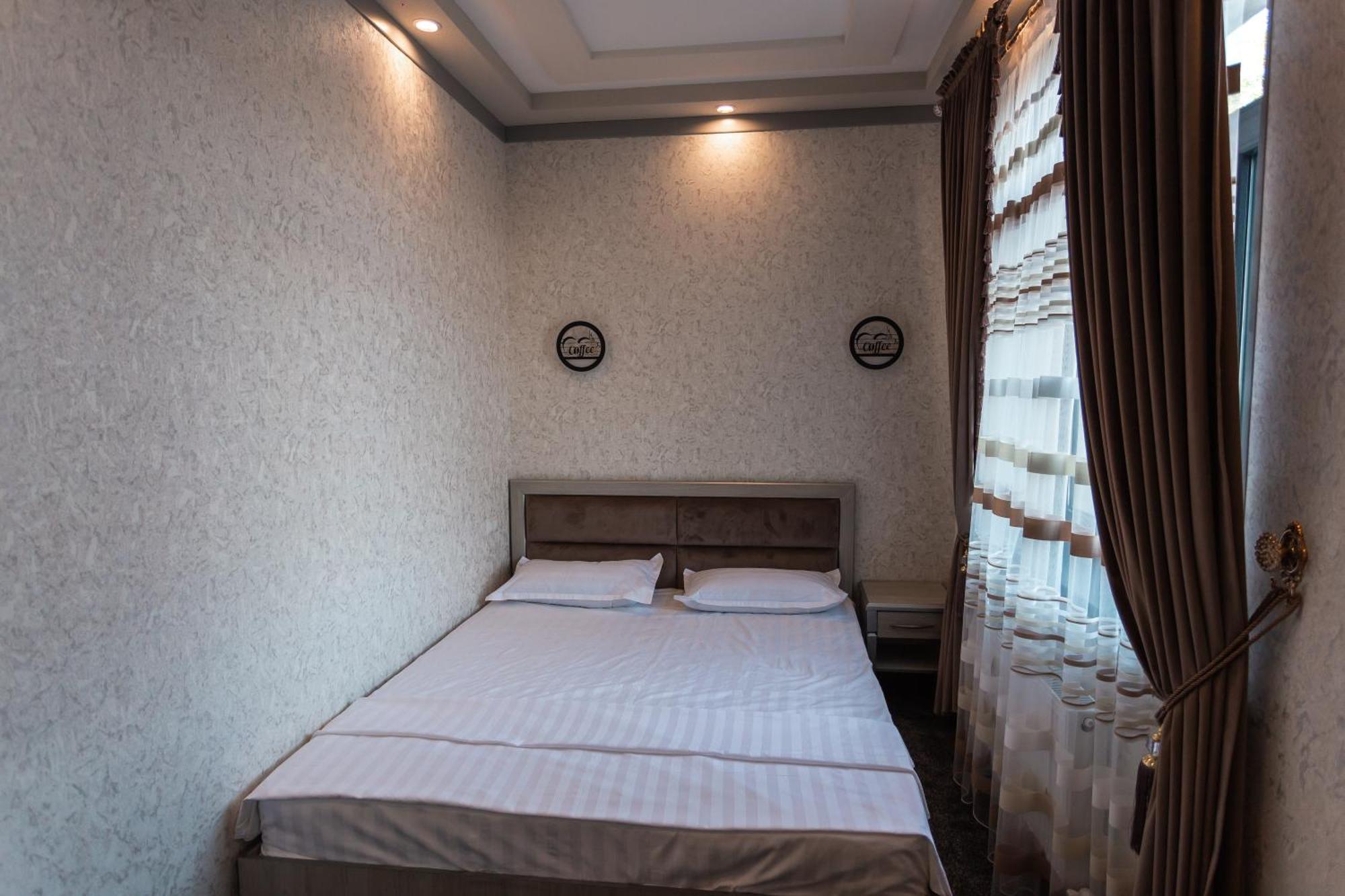 Diyor Hotel Marghilon Extérieur photo